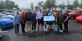 Skaneateles Cares Car Club group check presentation photo of fifty thousand dollars