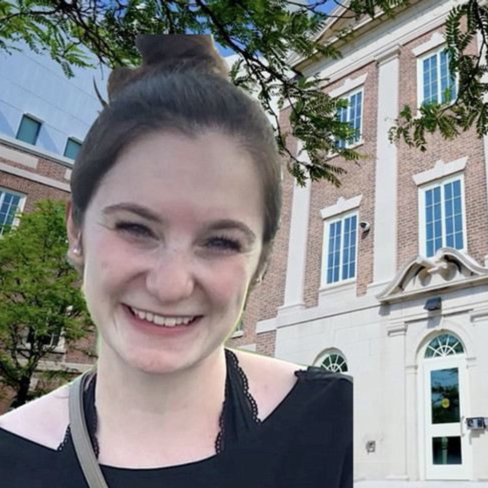 girl smiling in front of Weiskotten