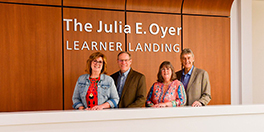 The landing in the Upsate Medical University Simulation Center has been named in memory of Julia Oyer. From left is Oyer's mother and stepfather, MaryBeth Oyer and Jeff Dunnewold; and her stepmother and father, Mary Ellen Oyer and Ezra Oyer.